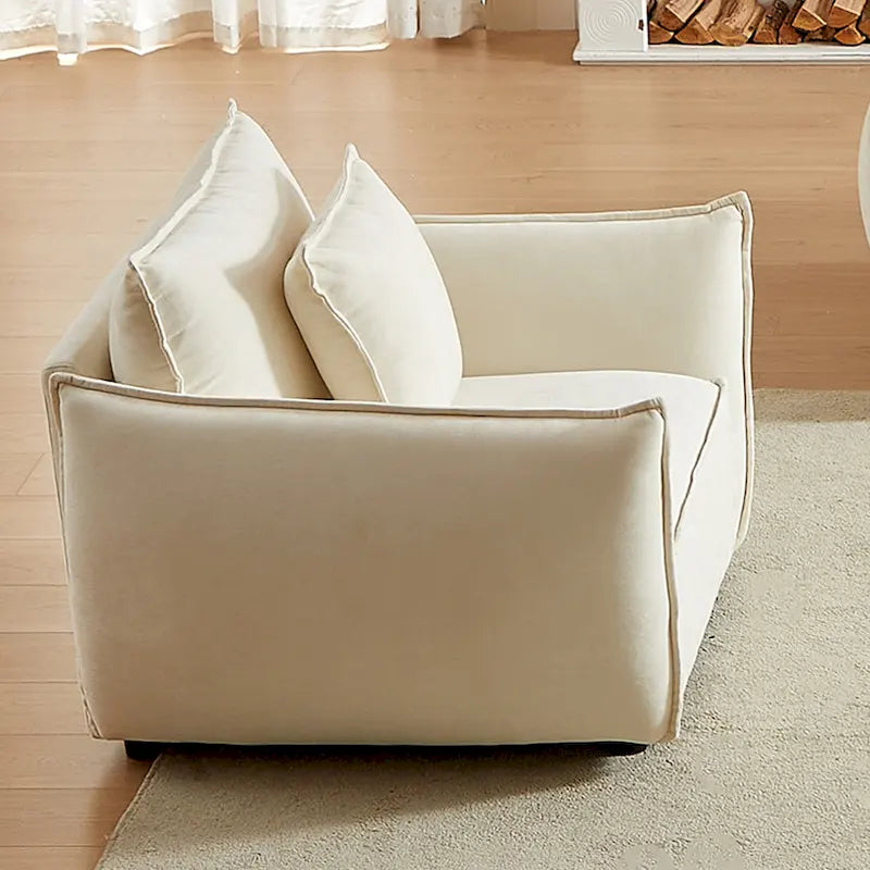Fauteuil rembourré avec coussins 44