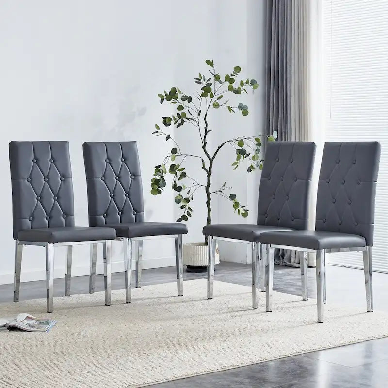 Cet ensemble de 4 chaises de salle à manger grises sans accoudoirs apporte une touche d'élégance et de mystère à la salle à manger grâce à son ton gris profond.