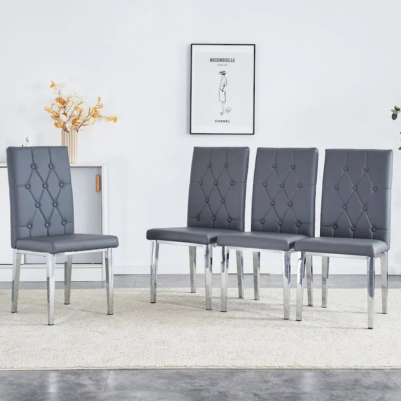 Cet ensemble de 4 chaises de salle à manger grises sans accoudoirs apporte une touche d'élégance et de mystère à la salle à manger grâce à son ton gris profond.