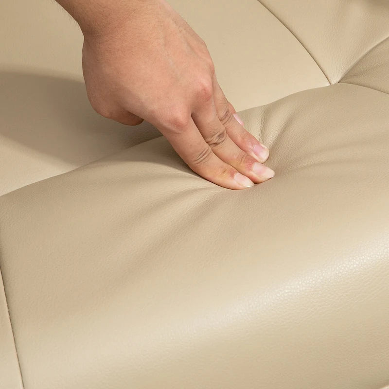 Fauteuil inclinable pivotant en cuir synthétique avec base en bois, dossier réglable et repose-pieds rétractable